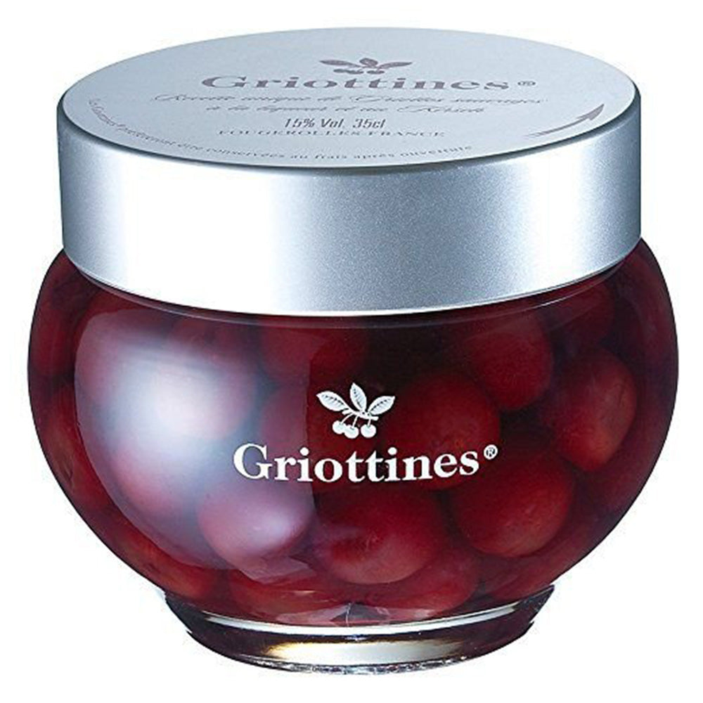 Jar of Griottines with a silver lid on a white background