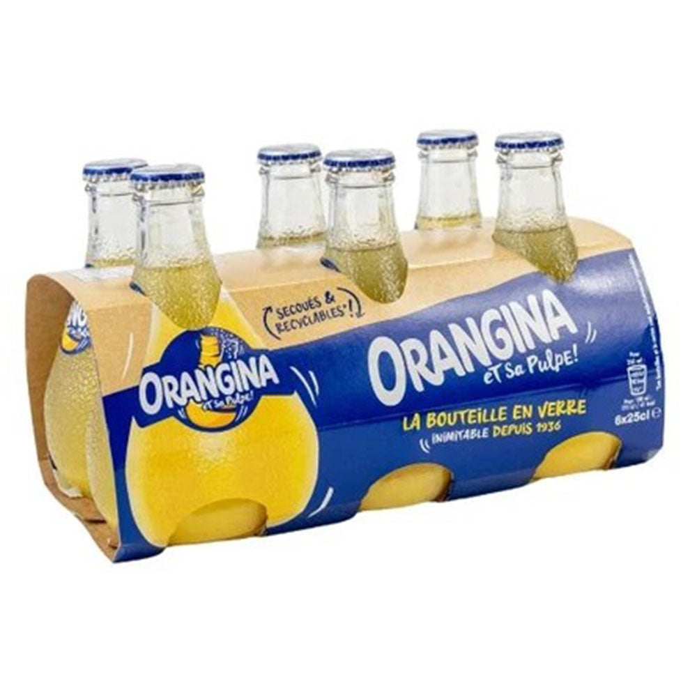 Pack of Orangina glass bottles with a cardboard holder on a white background