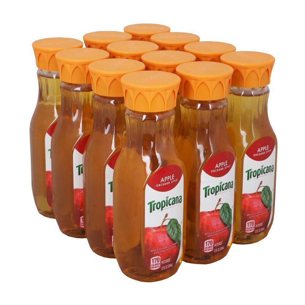 Case of Tropicana apple juice bottles with orange caps on a white background