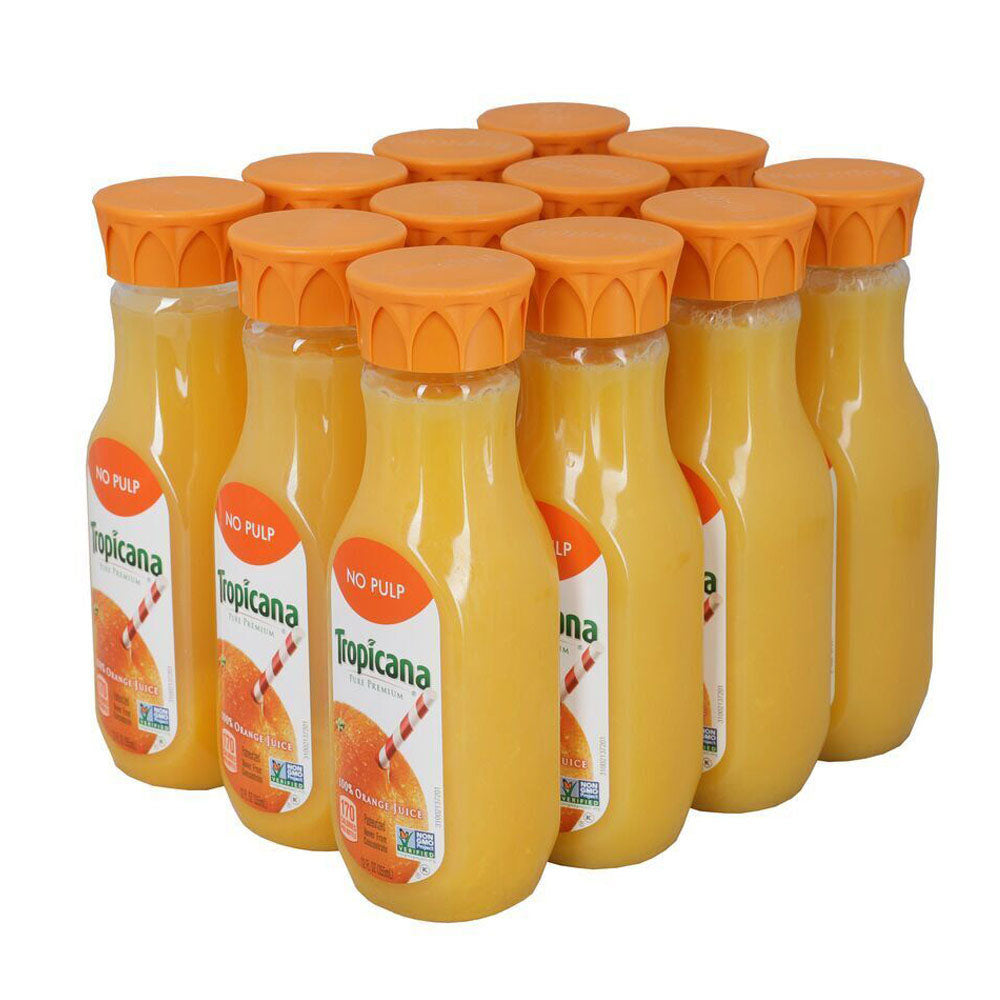 Multiple bottles of Tropicana orange juice with orange caps on a white background